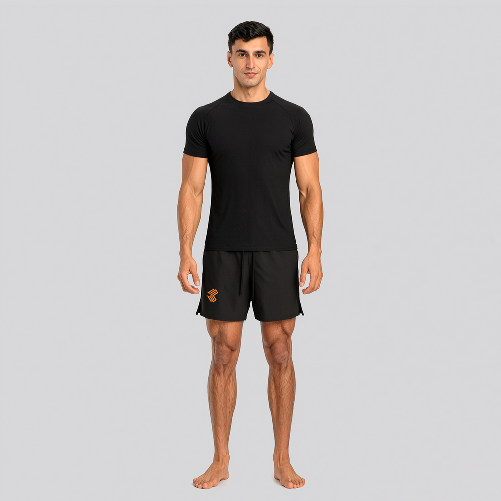 Liga Combat Rounds Training Shorts studio product shot, black loose knee-length training shorts