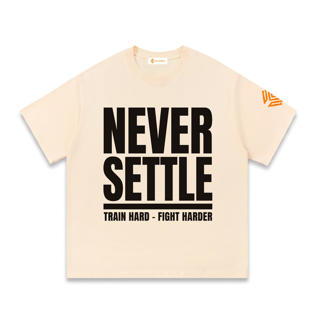 Liga Combat Never Settle Tee front view on an invisible mannequin showing the full black statement print on natural cotton