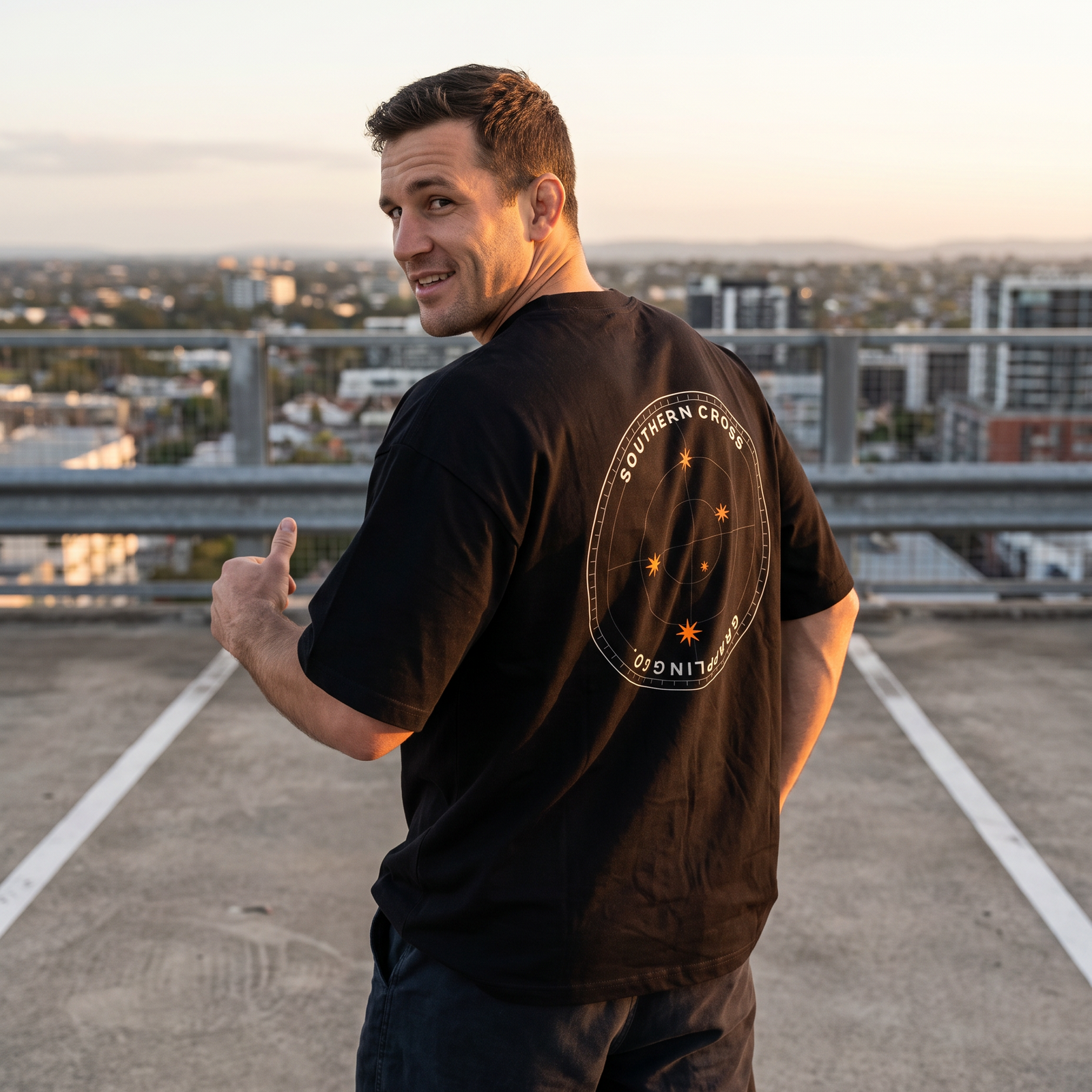 Woman in the Liga Combat Never Settle Tee crossing a city street with coffee and a gym bag
