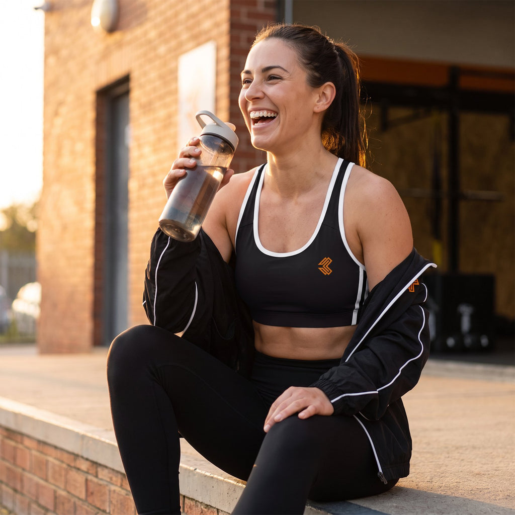 Liga Combat Mat Hours Sports Bra worn after training outside the gym at golden hour